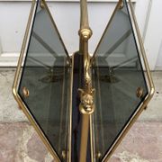 Revised door in brass and smoked glass