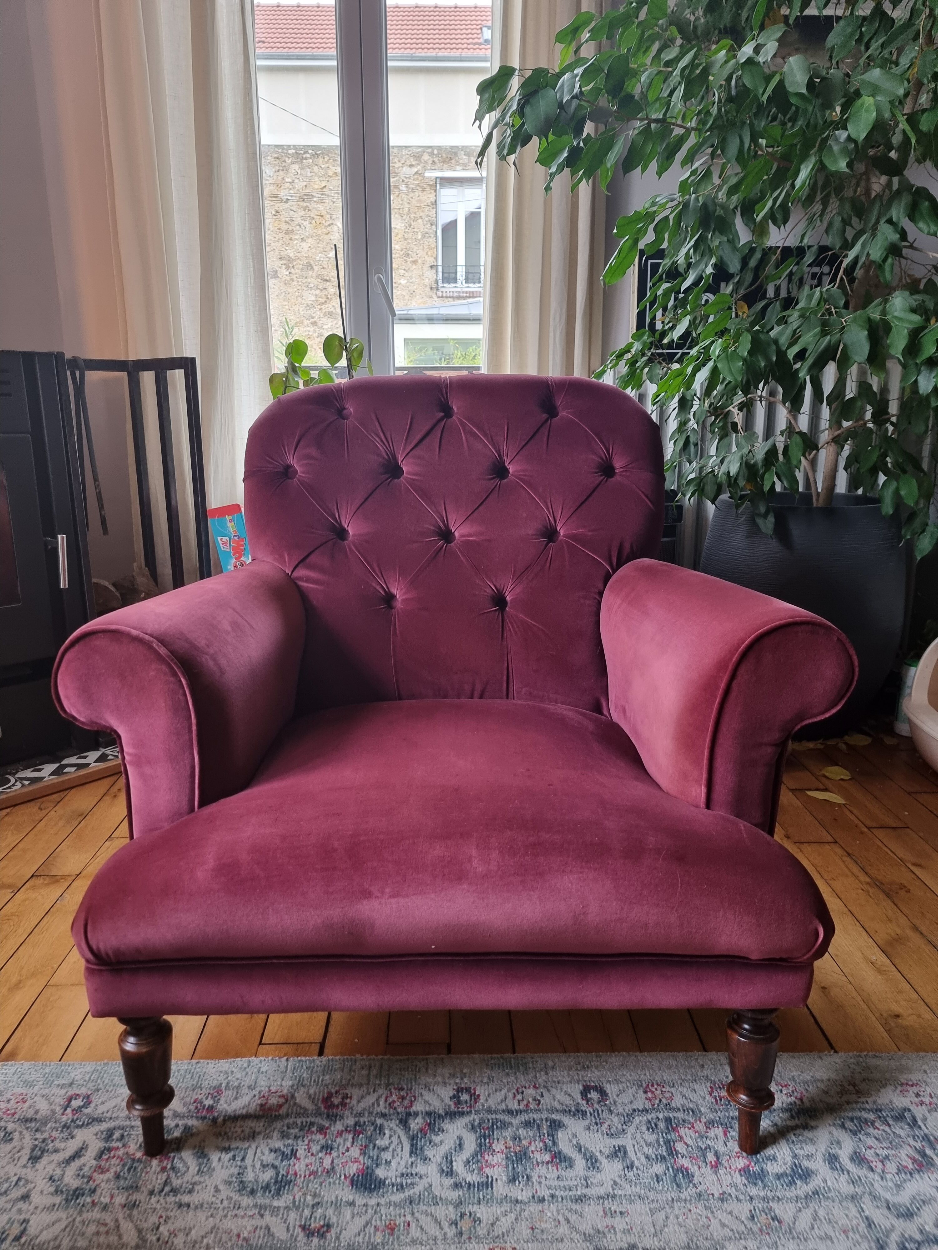 Upholstered velvet armchair