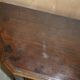 Hand-carved commode from 1685 with sideboards and side cupboards.