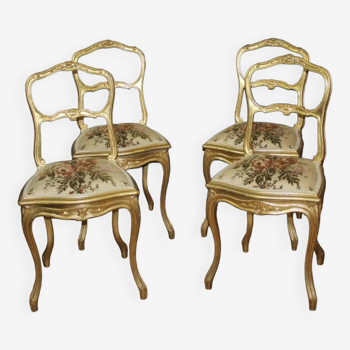 Suite de quatre chaises en bois doré de style louis xv fin xix