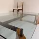 Old coffee table in glass and magnifying glass, French design Paul Michel, year 70