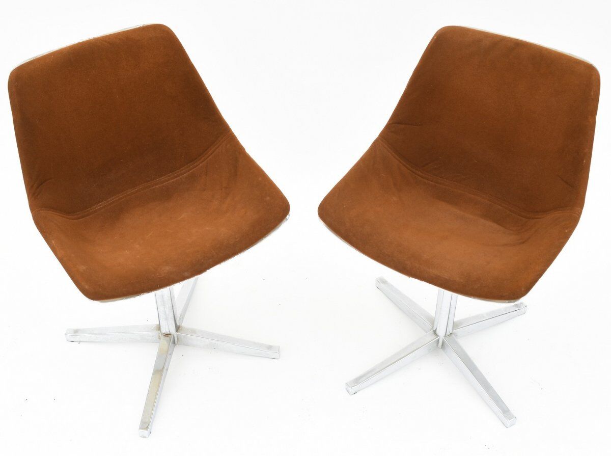 Pair of swivel chairs by Roland Schweitzer