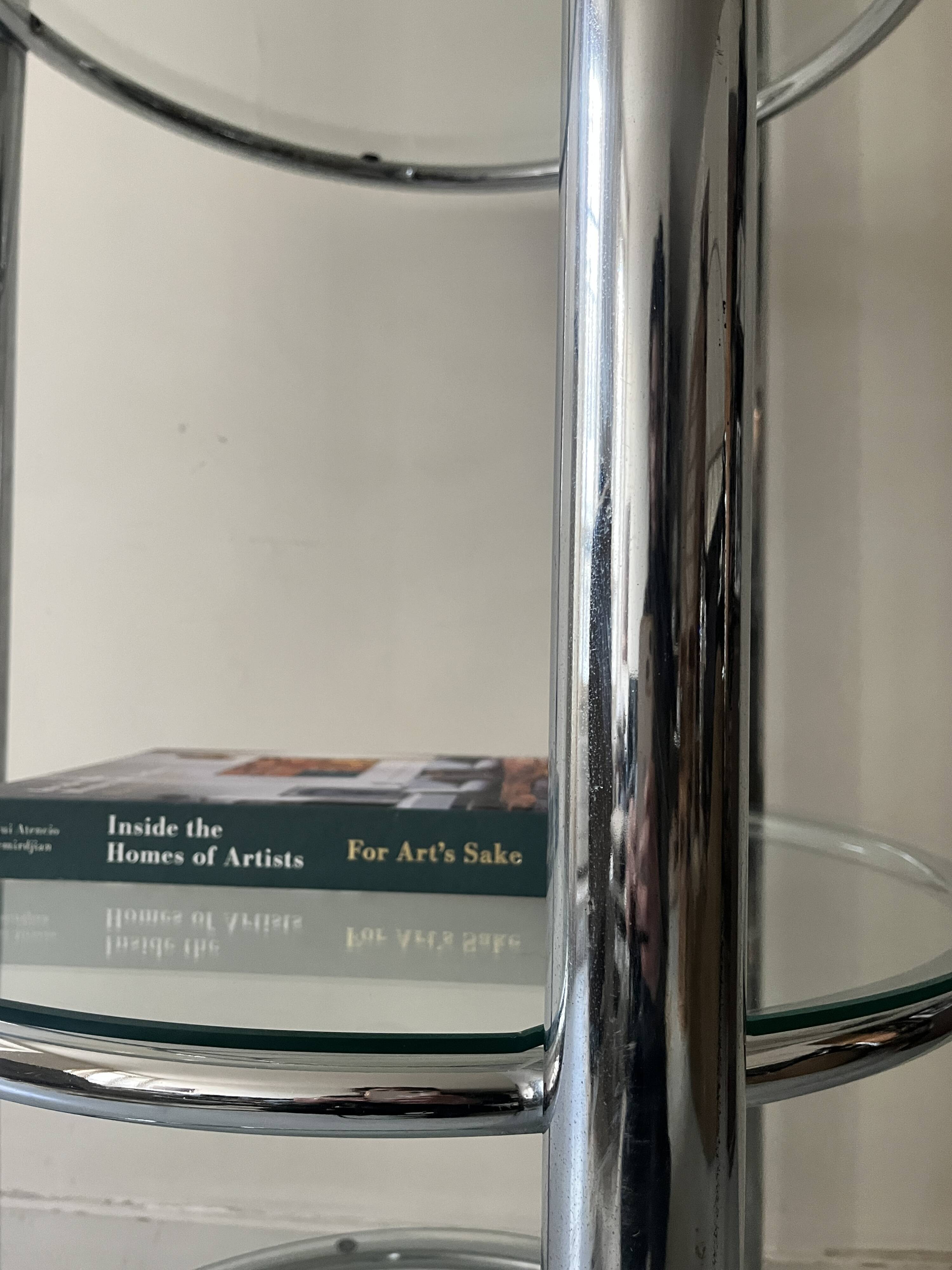 Round tubular bookcase in chrome and glass, 1970 design