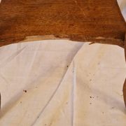 Antique Art Nouveau pedestal table with carved wood and marble top.
