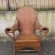 Arts & Crafts armchair in wicker and rattan attributed to Dryad & Co, UK, circa 1920.
