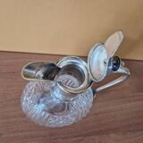 Cut crystal carafe and silver-plated metal