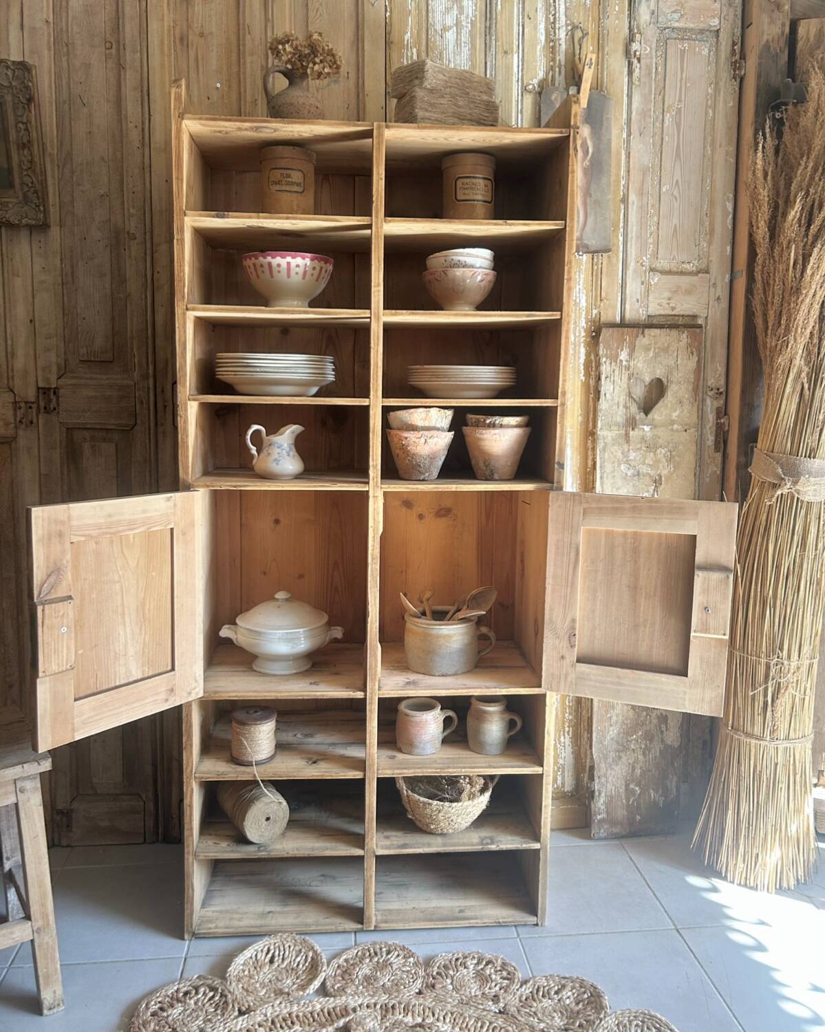 Antique workshop cabinet with compartments and doors