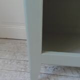 Vintage shallow bookcase re-enchanted in verdigris.