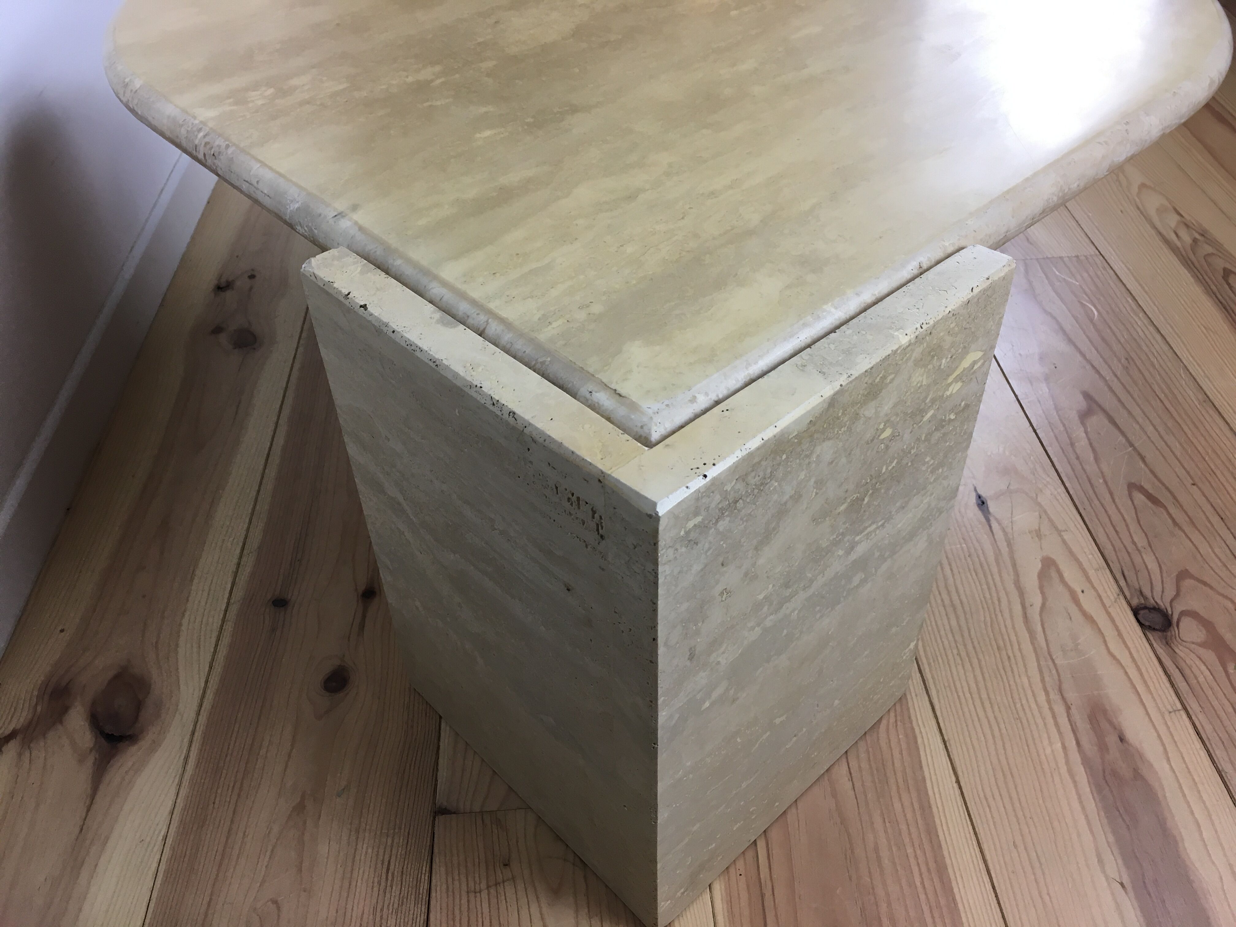 Bass table in travertine Roche Bobois
