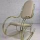 1960s rocking chair in brass and ecru imitation leather