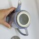 Art deco coffee service in fine iridescent blue porcelain, metal and wood