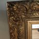 Mirror with large molded frame in gilded plaster with gold leaf