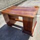 Bureau art deco en noyer 3 tiroirs et une porte