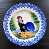 Old plate with rooster decoration