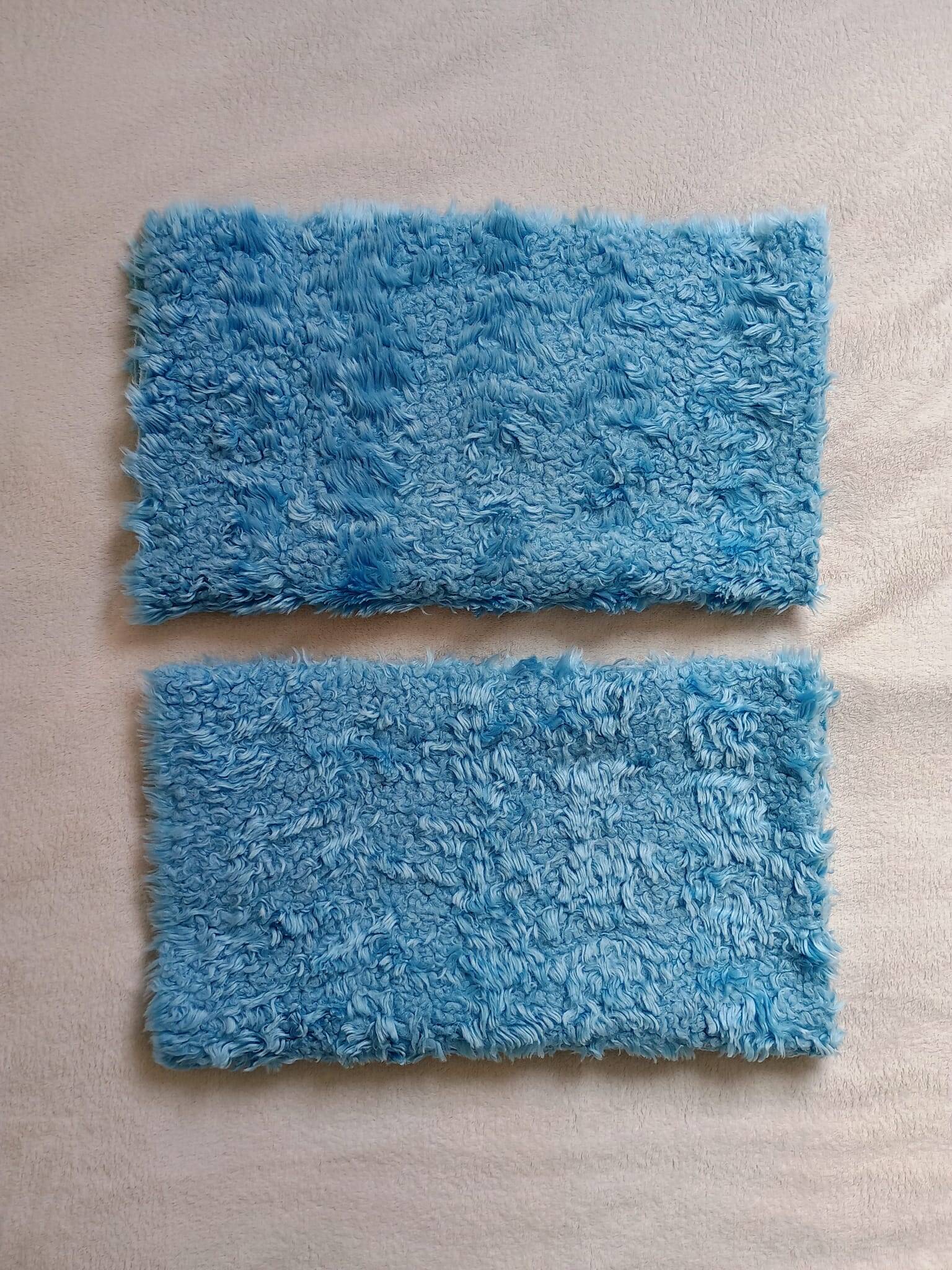 Set of two vintage sky blue rugs from the 70s
