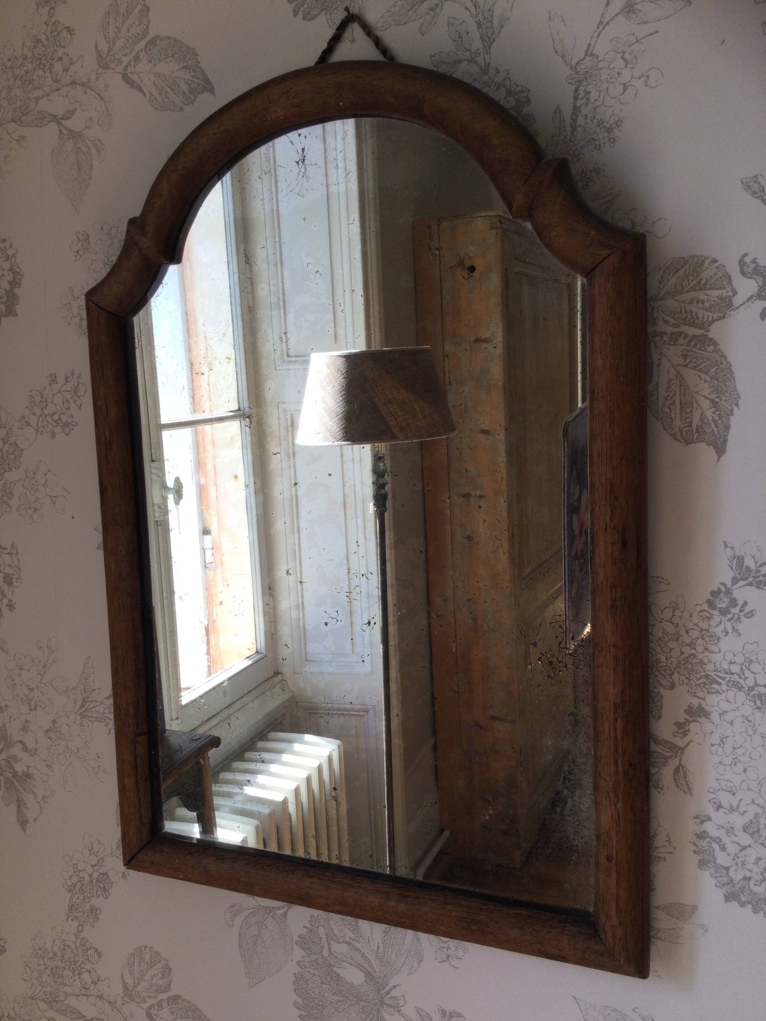 Antique tall round mirror