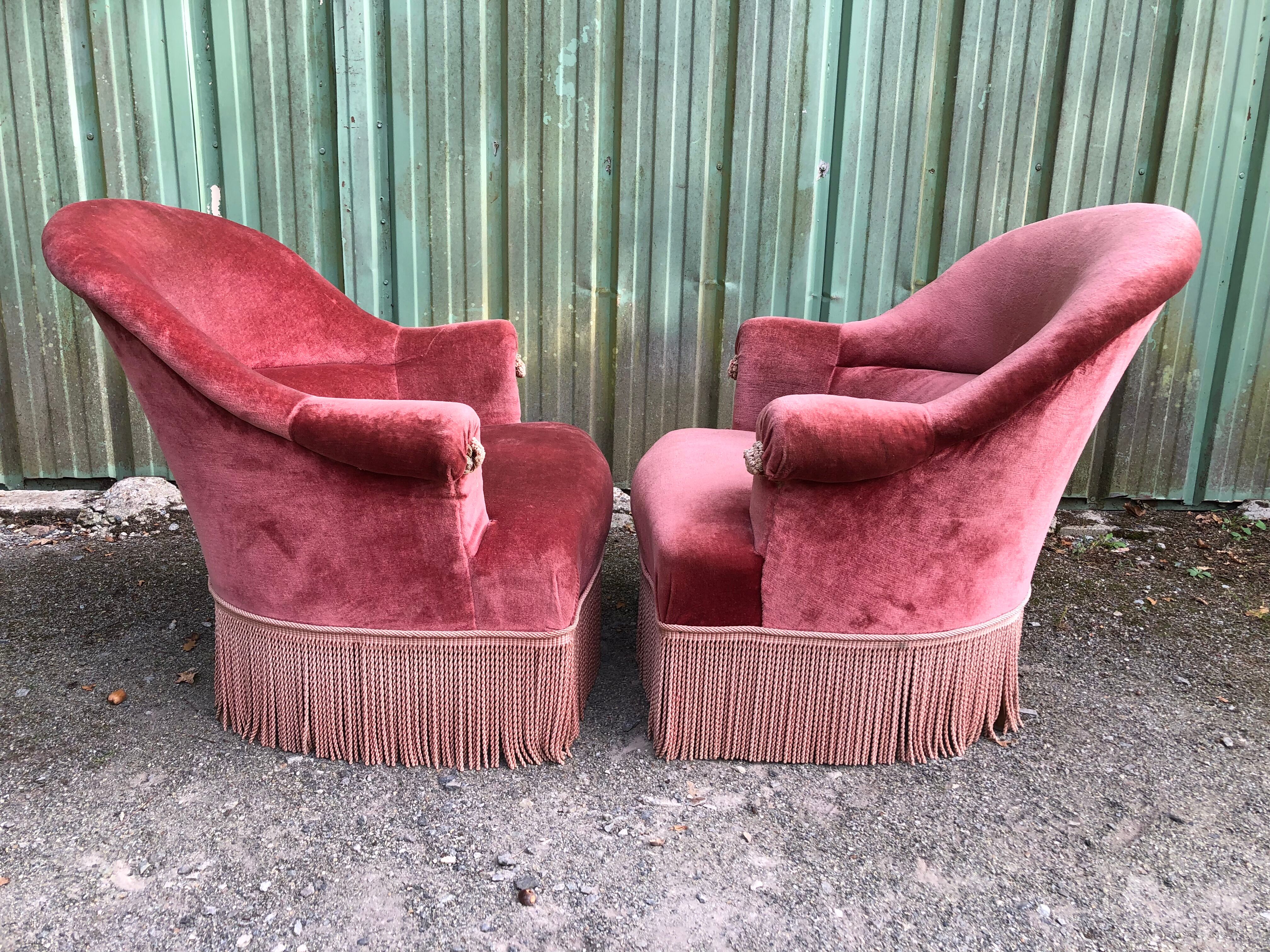Duo de fauteuils vintage crapaud en velours saumon