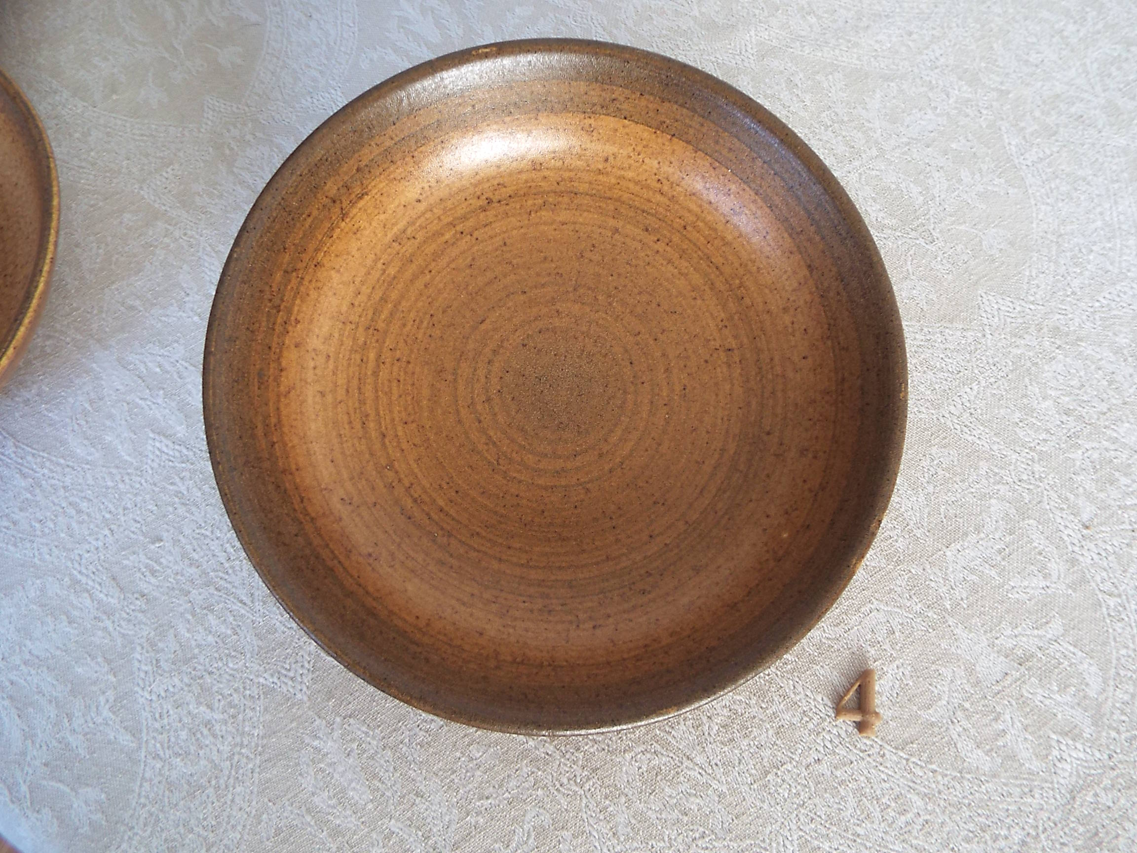 4 Longchamp stoneware hollow plates