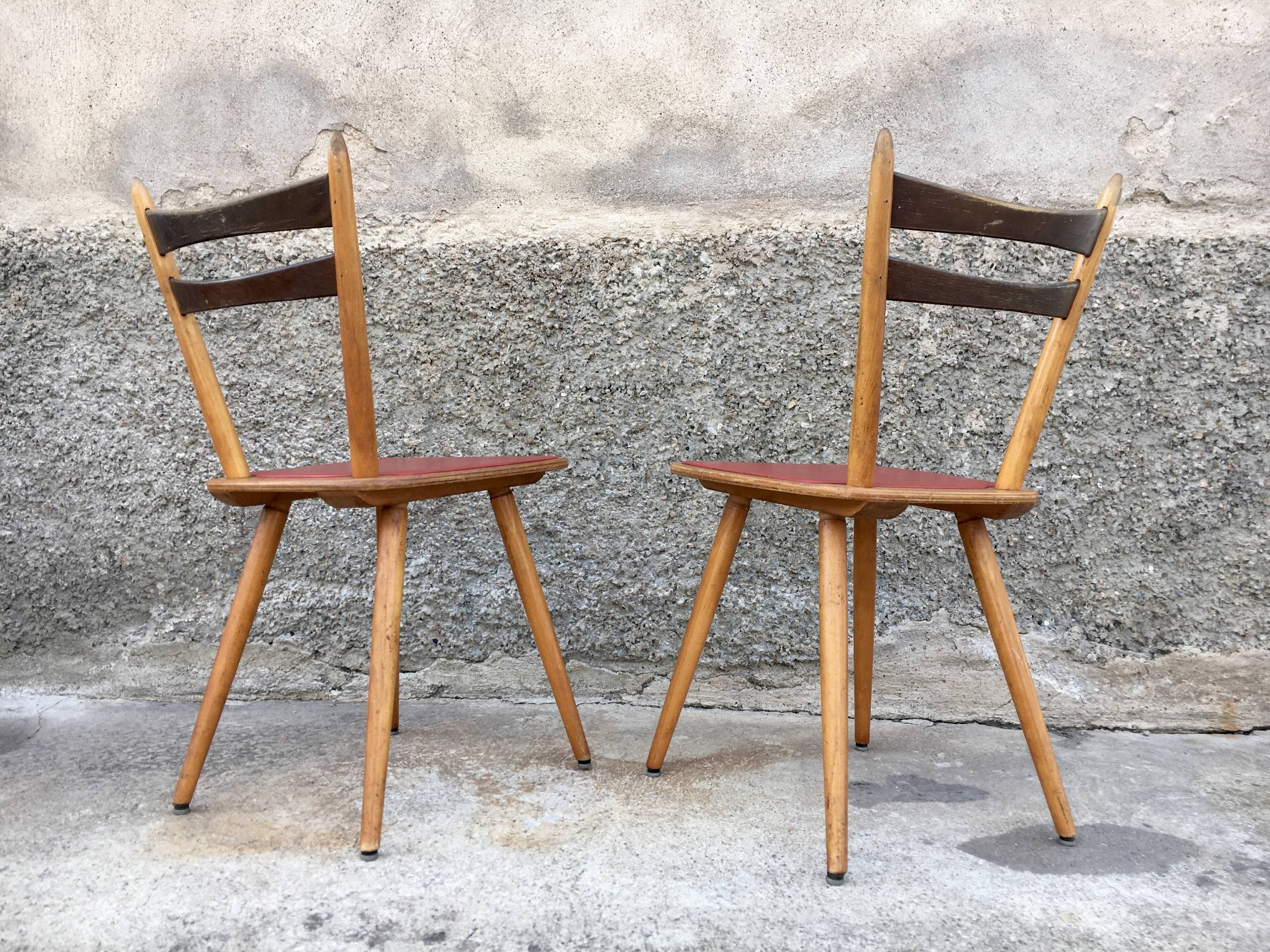 Pair of bistro and bohemian beech chairs, compass feet 1950