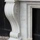 Large Charles X fireplace in white Carrara marble, 19th century.