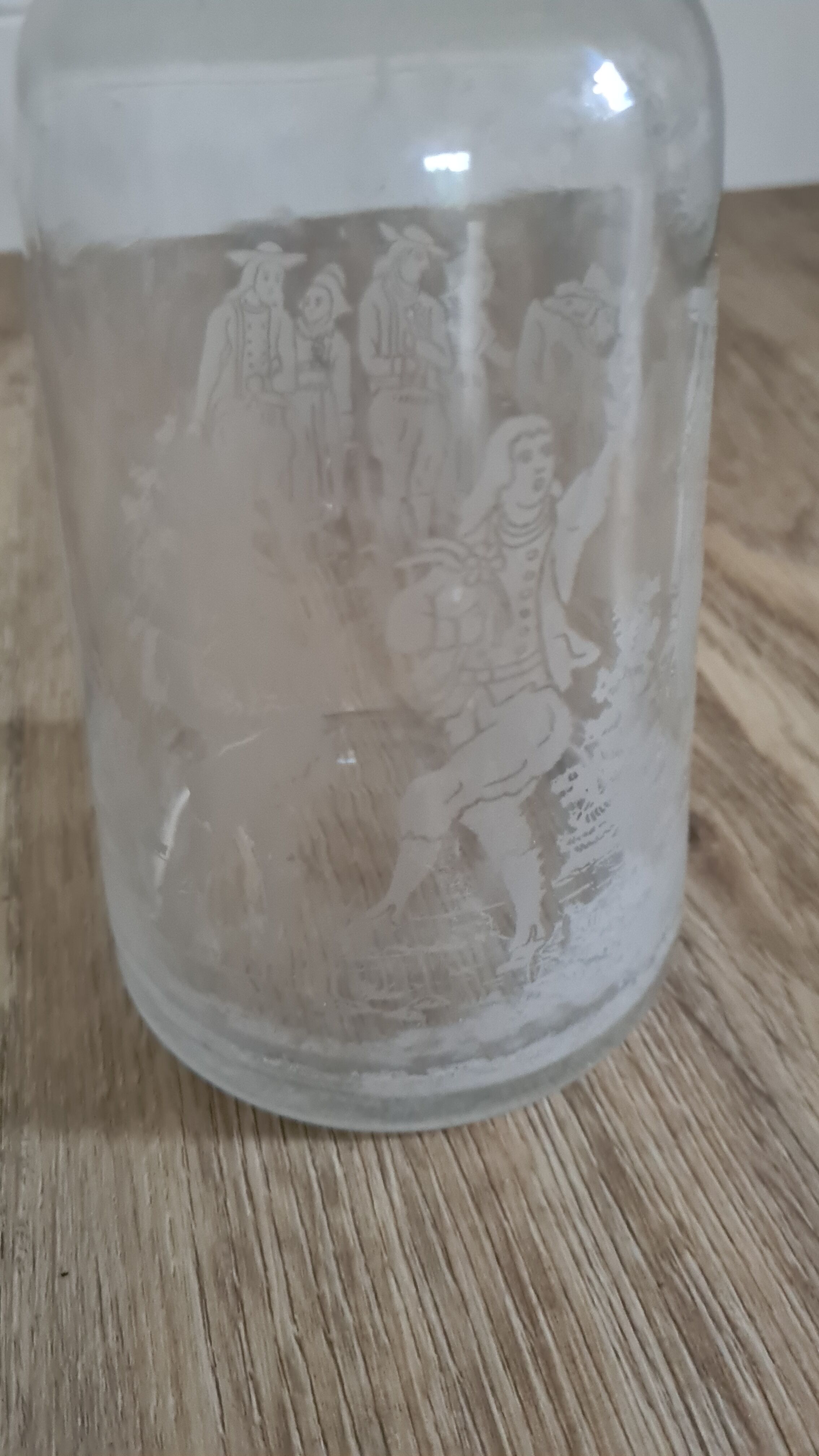 Glass decanter with character designs