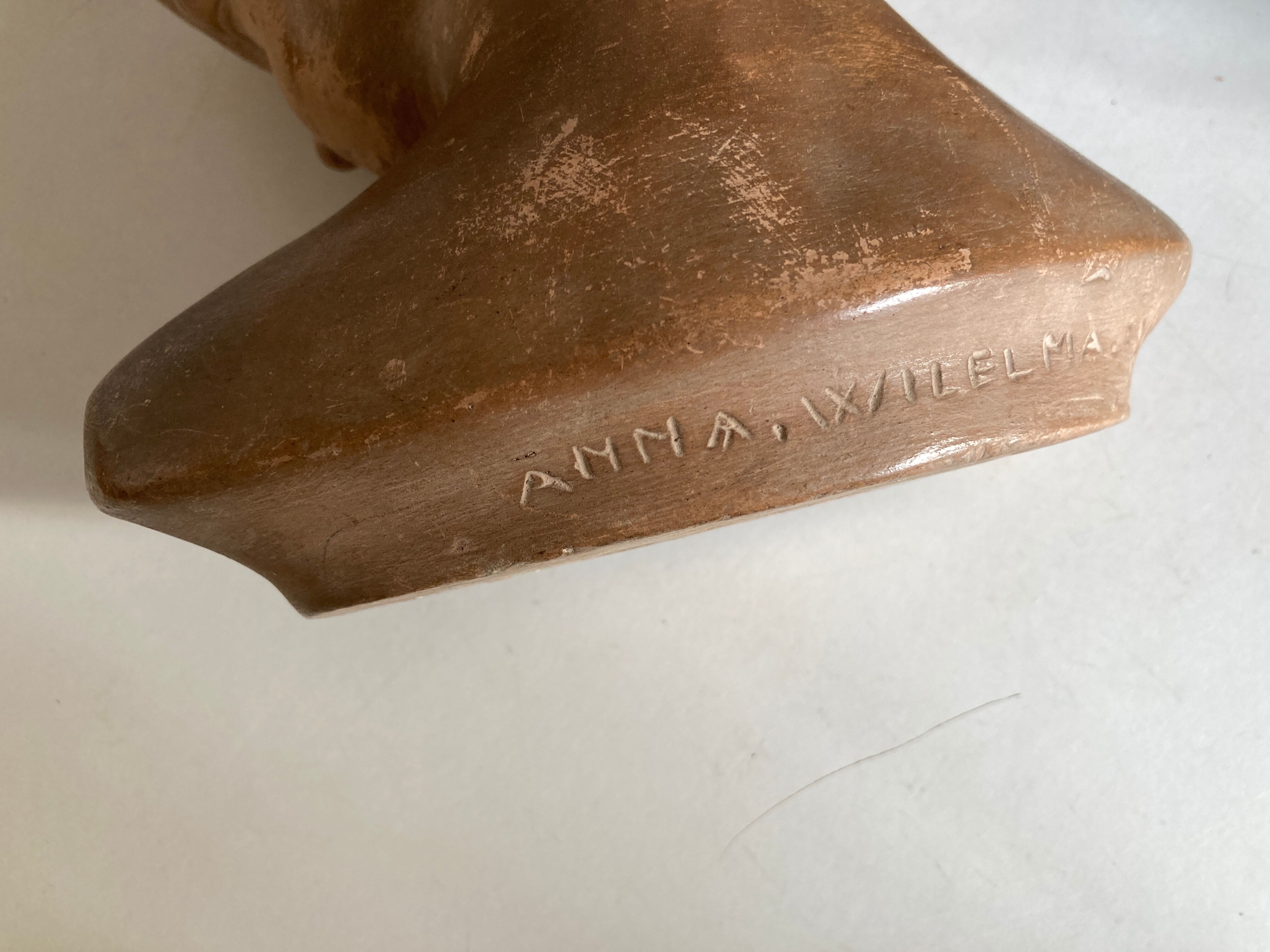 Child's head in terracotta 1920 wooden base