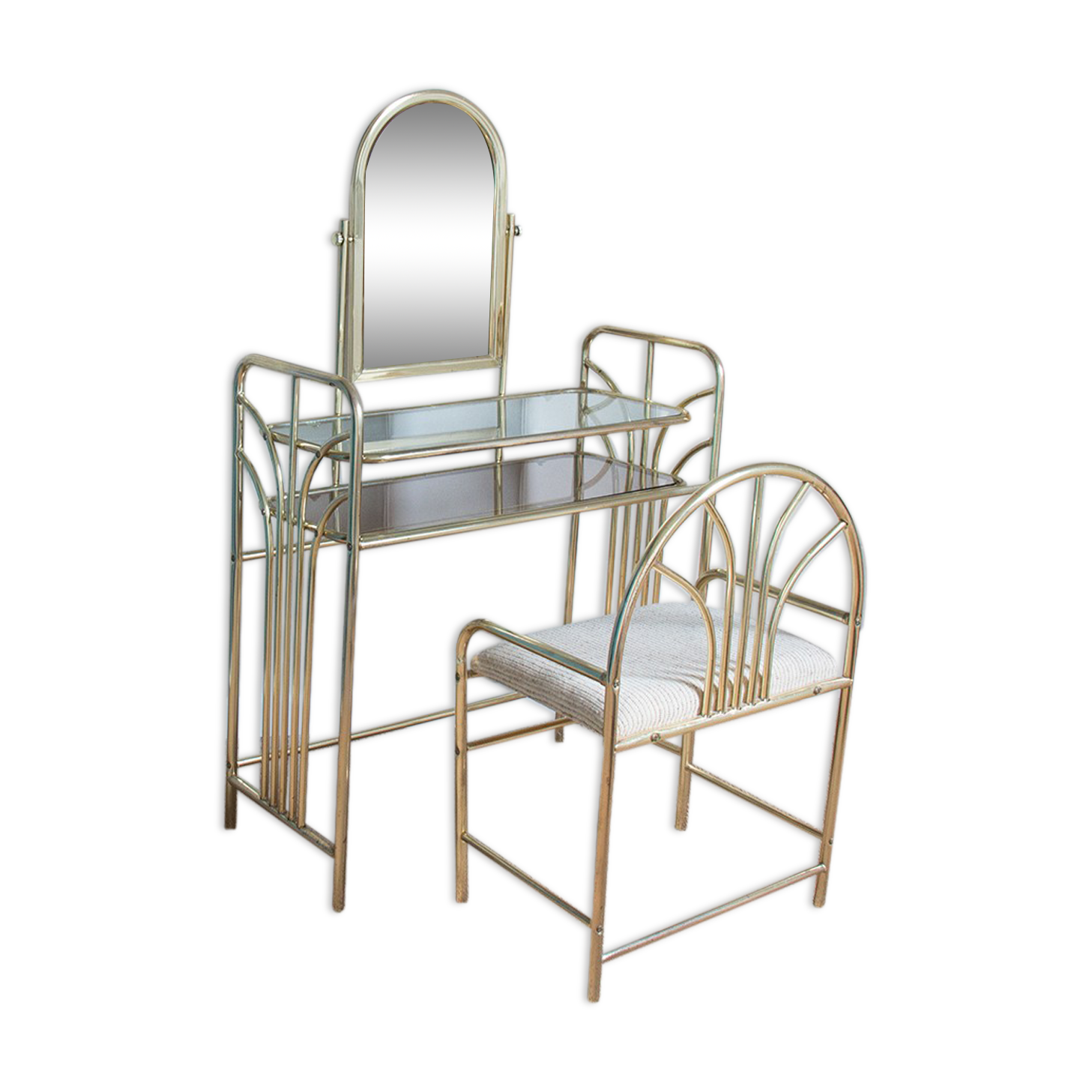 Dressing table in gold metal