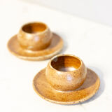 2 stoneware shells, unidentified signature