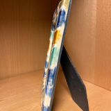 Enamelled ceramic frame