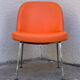 Chauffeuse vintage orange skaï et chrome 1970