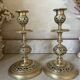 pair of openwork gilded brass candlesticks from the 19th century