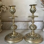 pair of openwork gilded brass candlesticks from the 19th century