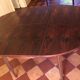 Table ronde en palissandre, extensible