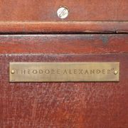 Theodore Alexander library in faux books in burl laurel.