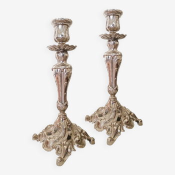 Pair of old rocaille style torchlight candlesticks in regula