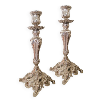 Pair of old rocaille style torchlight candlesticks in regula