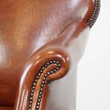 Fauteuil ancien en peau de mouton entièrement restauré
