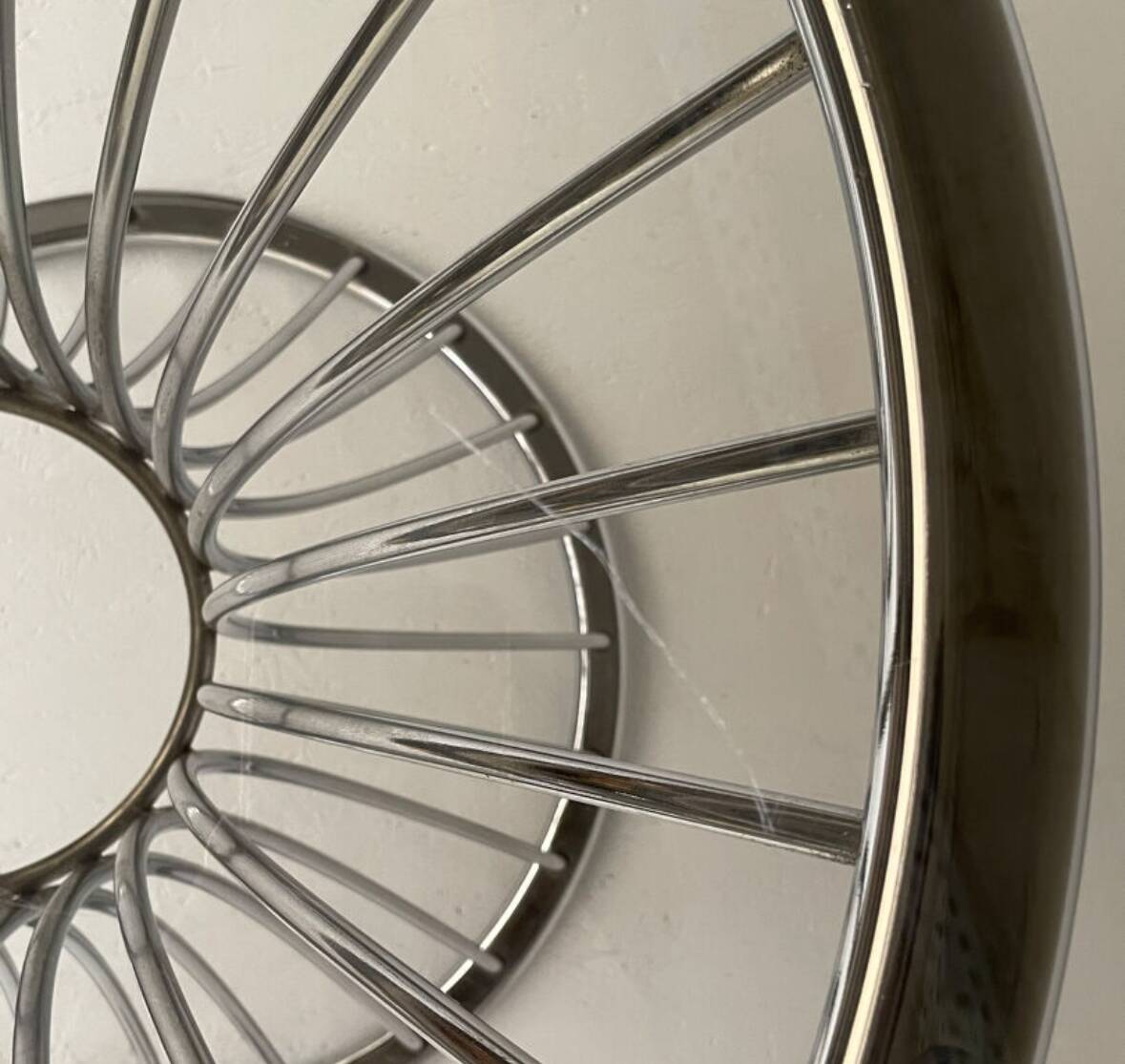 Space Age round dining table in chrome metal and smoked glass.