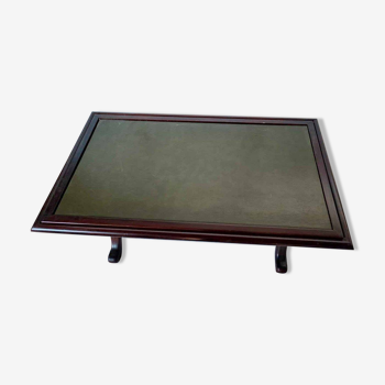 Living room coffee table with green leather and wood top