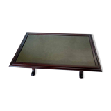 Living room coffee table with green leather and wood top