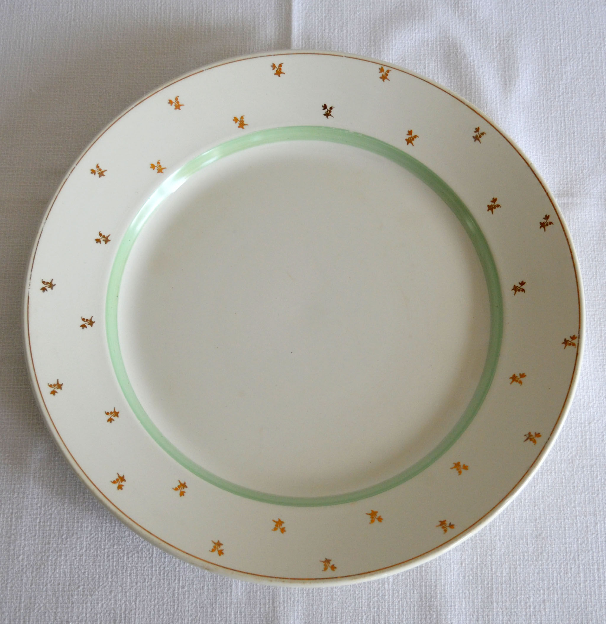 Round dish Gien with gold flowers