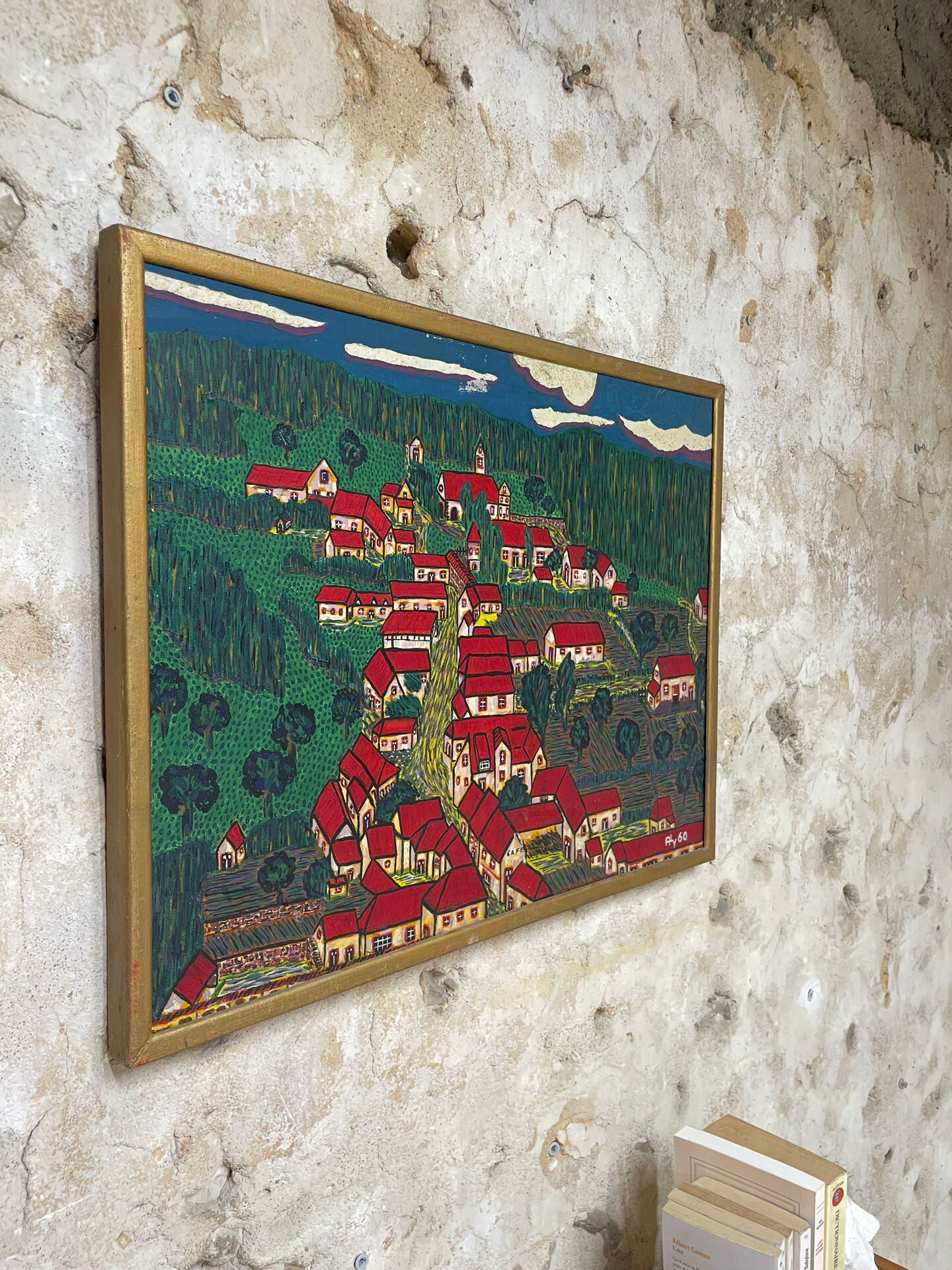 Painting the village with red roofs.