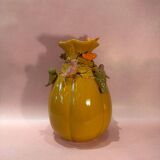 Yellow vase decorated with birds