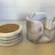 Four marble coasters with holder