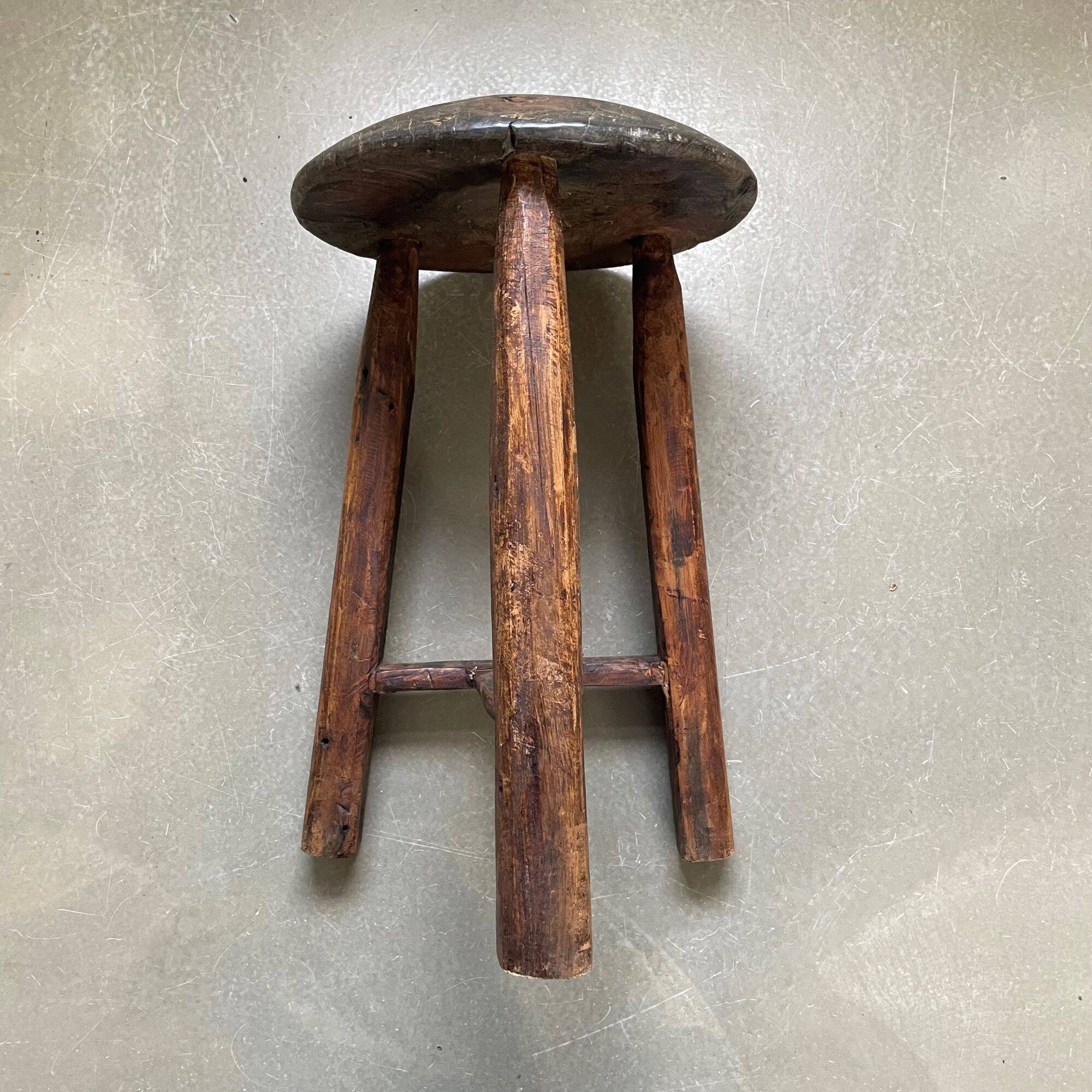 Antique tripod wooden stool, brutalist, wabi sabi style