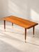 Table basse en teck de style mid-century moderne avec pieds en laiton, Suède vers 1960