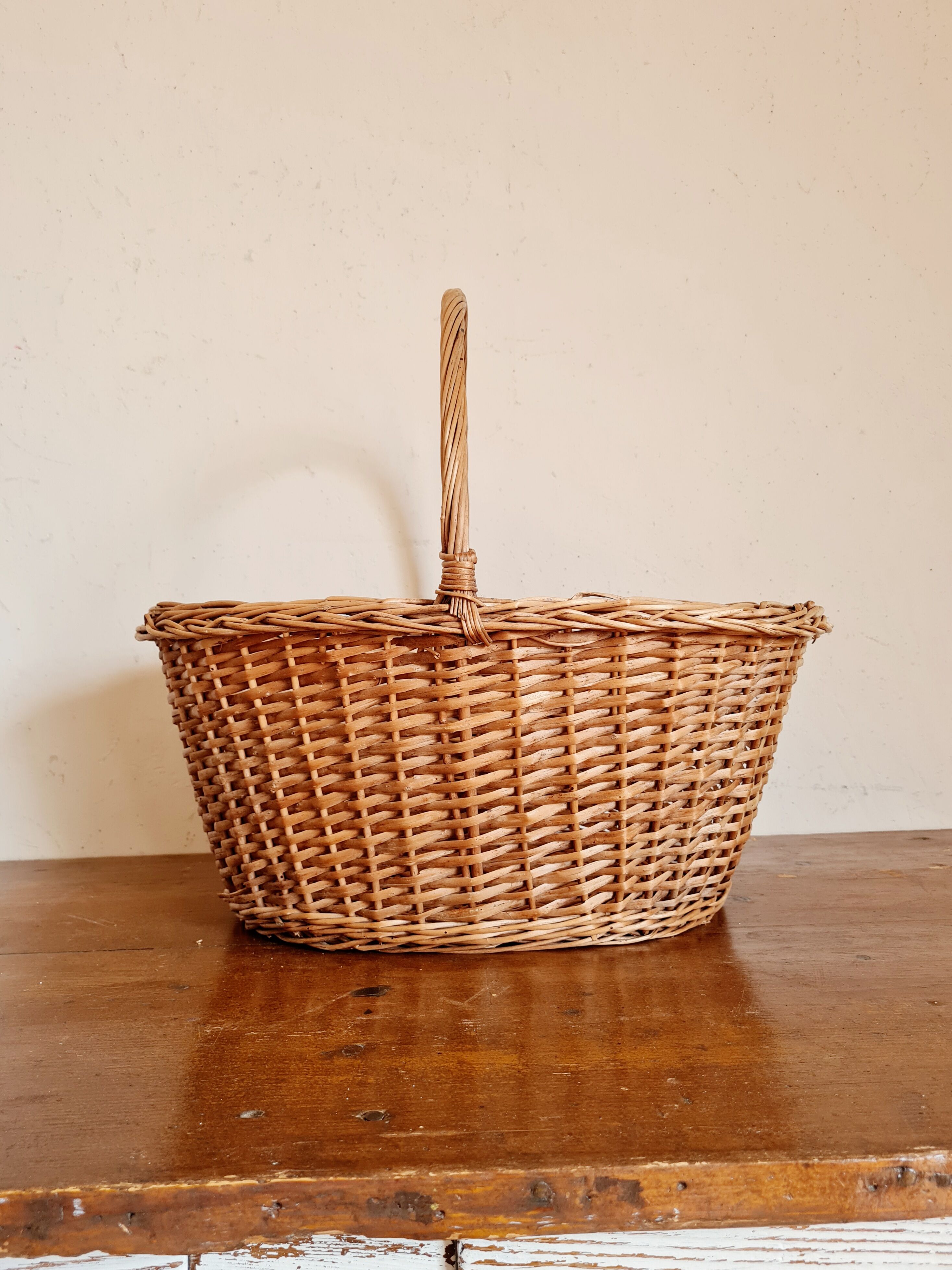 Old basket in woven rattan