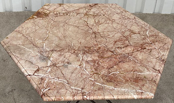 Wrought iron and marble garden table