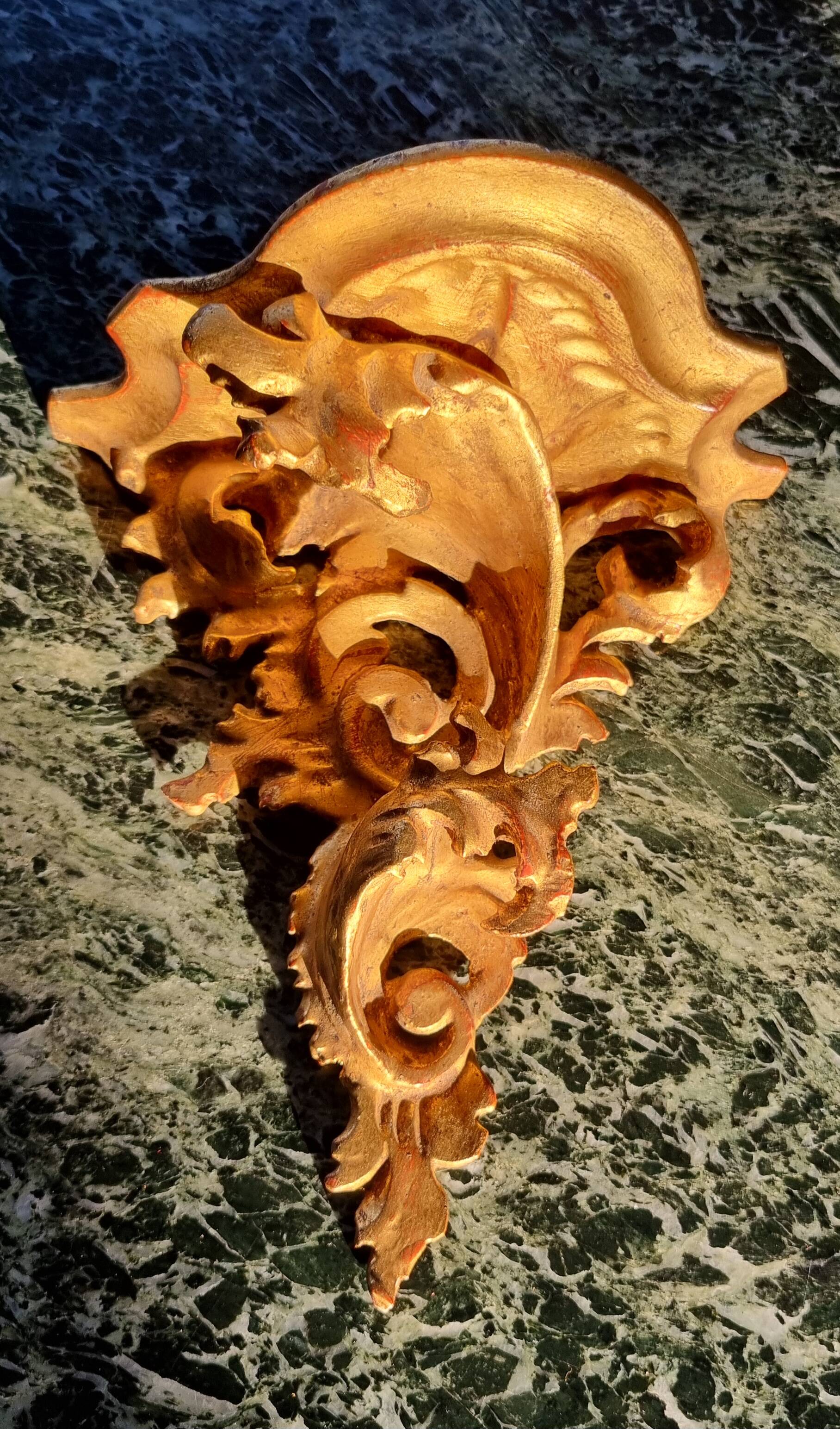 Golden wall shelf in Rococo style from the 1950s.