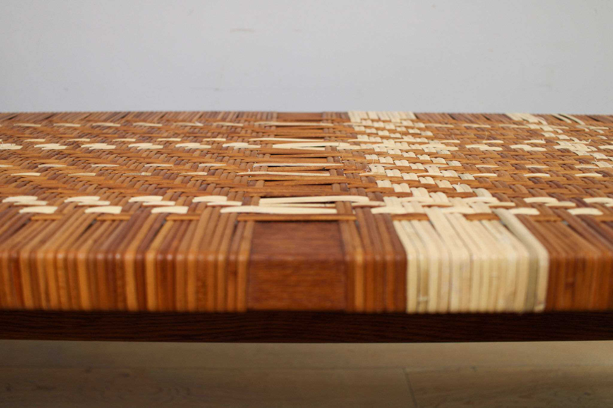 A vintage mid-century Danish Borge Mogensen 5272 rattan coffee table/bench
